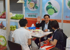 Mr Phan Vu Hoang from FRESHFRUITis receiving visitors at the booth. The company supplies a wide variety of fresh fruits from Vietnam, including mangos, dragon fruits, passion fruits and coconuts.